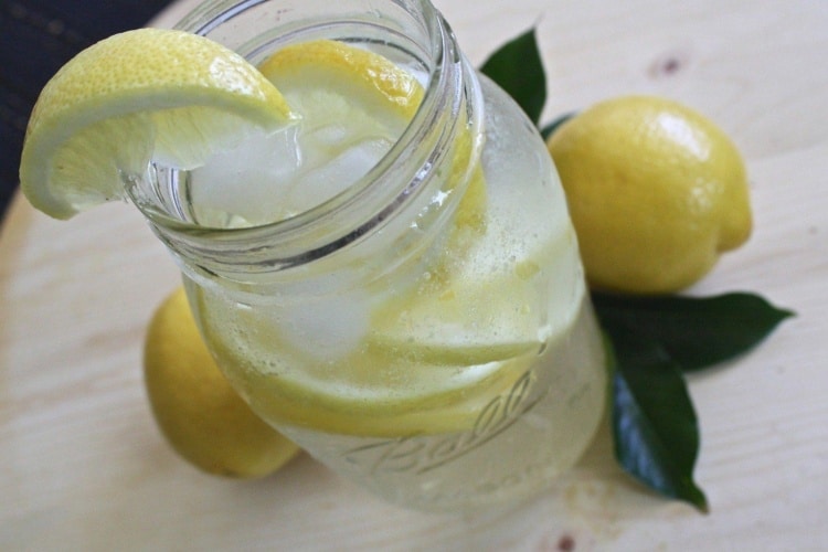 Lemonade in mason jar with lemons