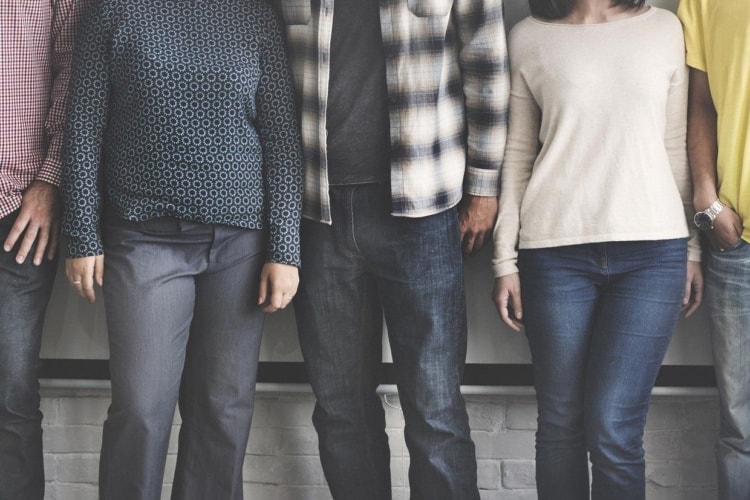 Group of people wearing jeans