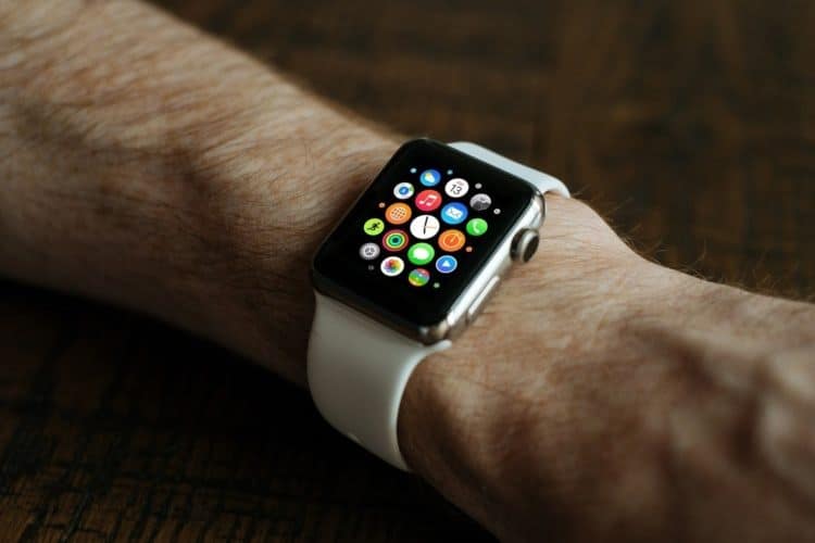 Apple Watch on wrist showing apps